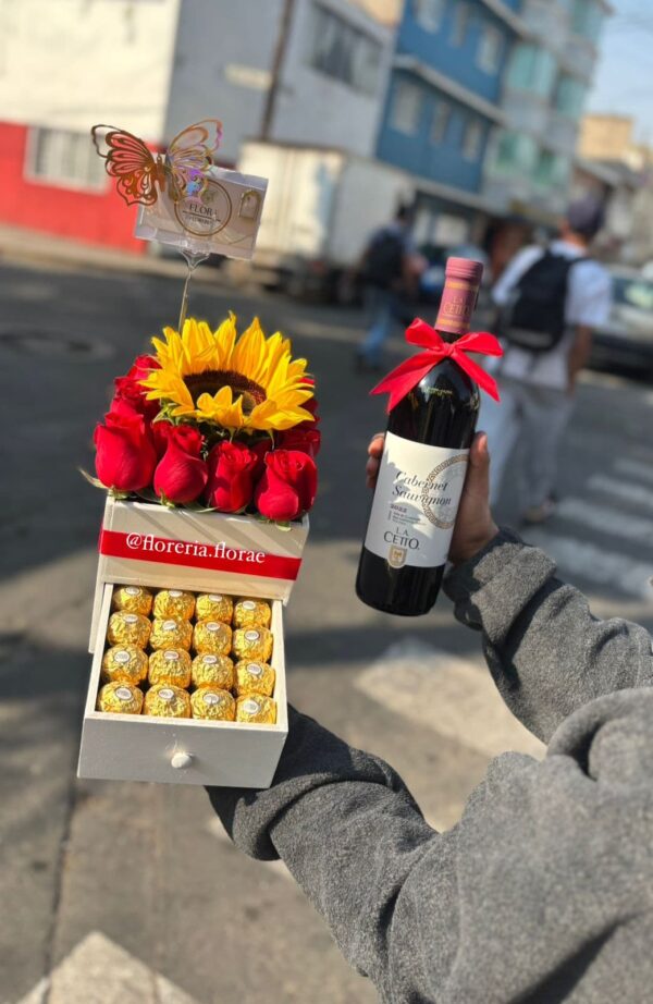 caja con rosas girasol y chocolates mas vino