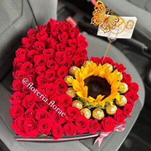 caja con rosas girasol y chocolates